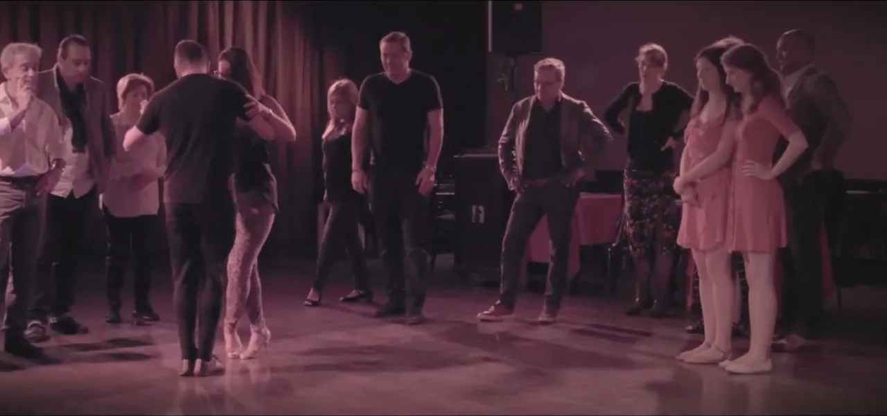 A tango lesson with couples dancing in Buenos Aires, Argentina