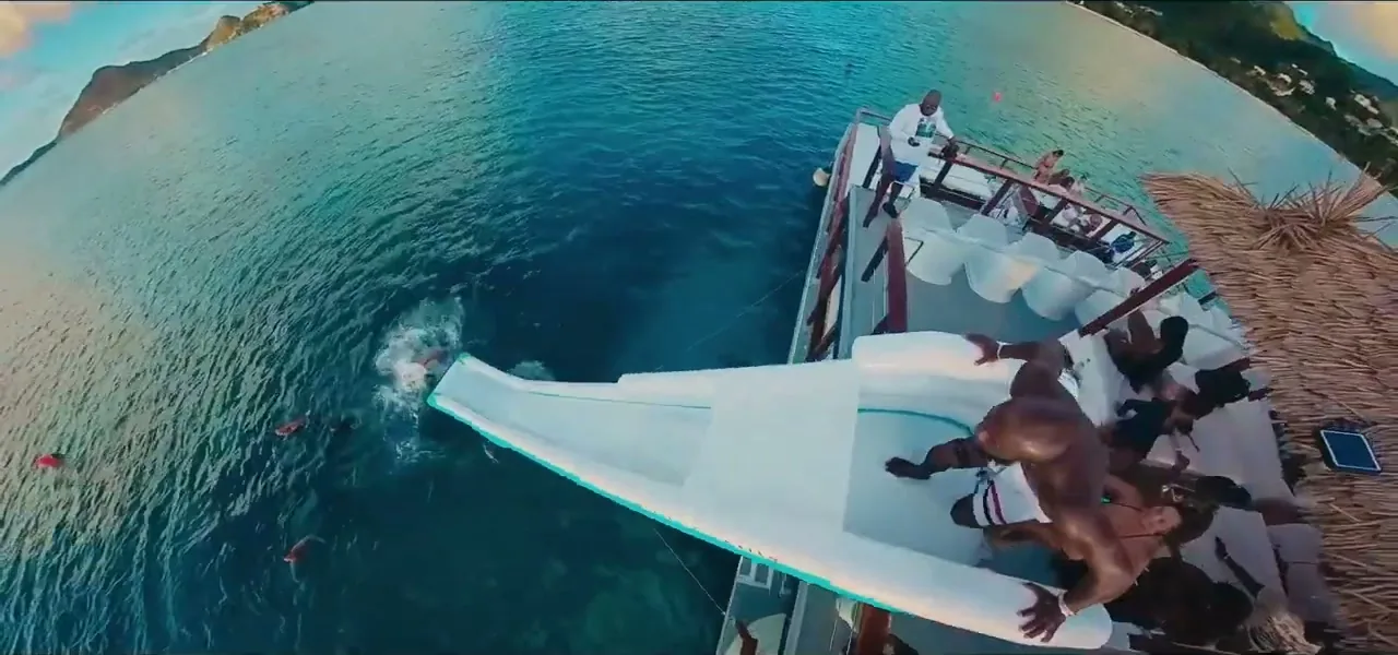 The Kai Coconut party catamaran with a waterslide off Antigua