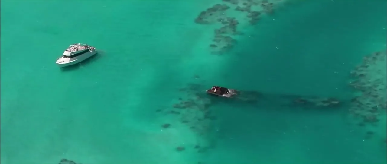 Aerial of the submerged HMS Vixen shipwreck in turquoise water off Bermuda