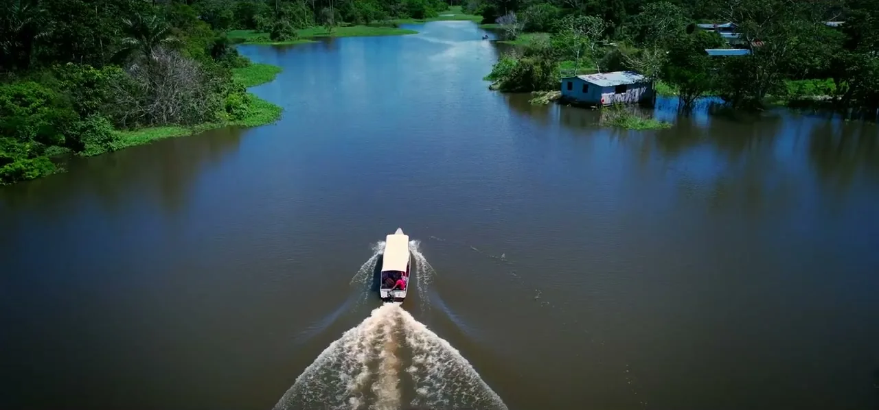 The Meeting of Waters where the dark Rio Negro and sandy Solimões flow side by side without blending near Manaus, Brazil