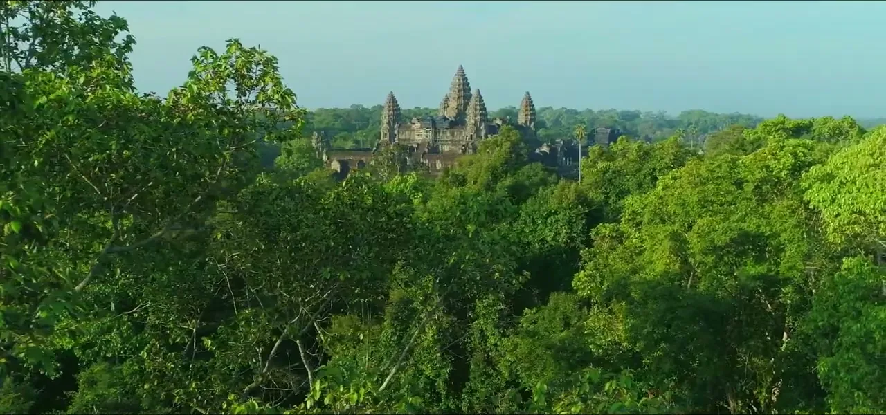 The towers of Angkor Wat rising above the jungle in Siem Reap, Cambodia