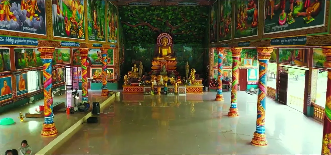 The brightly painted interior of a Buddhist pagoda in Cambodia