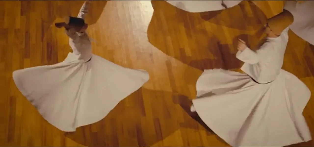 Whirling dervishes performing the Sufi Sema dance in Cappadocia