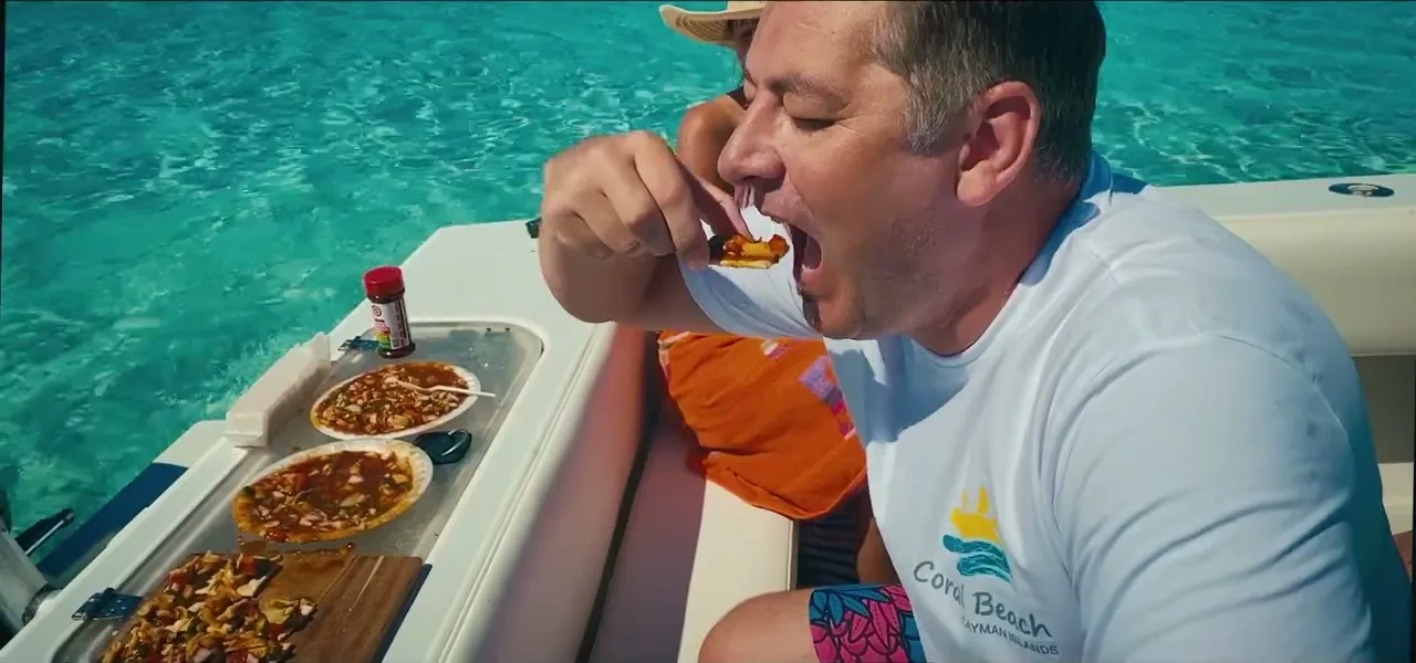Freshly prepared marinated conch eaten on a boat in the Cayman Islands