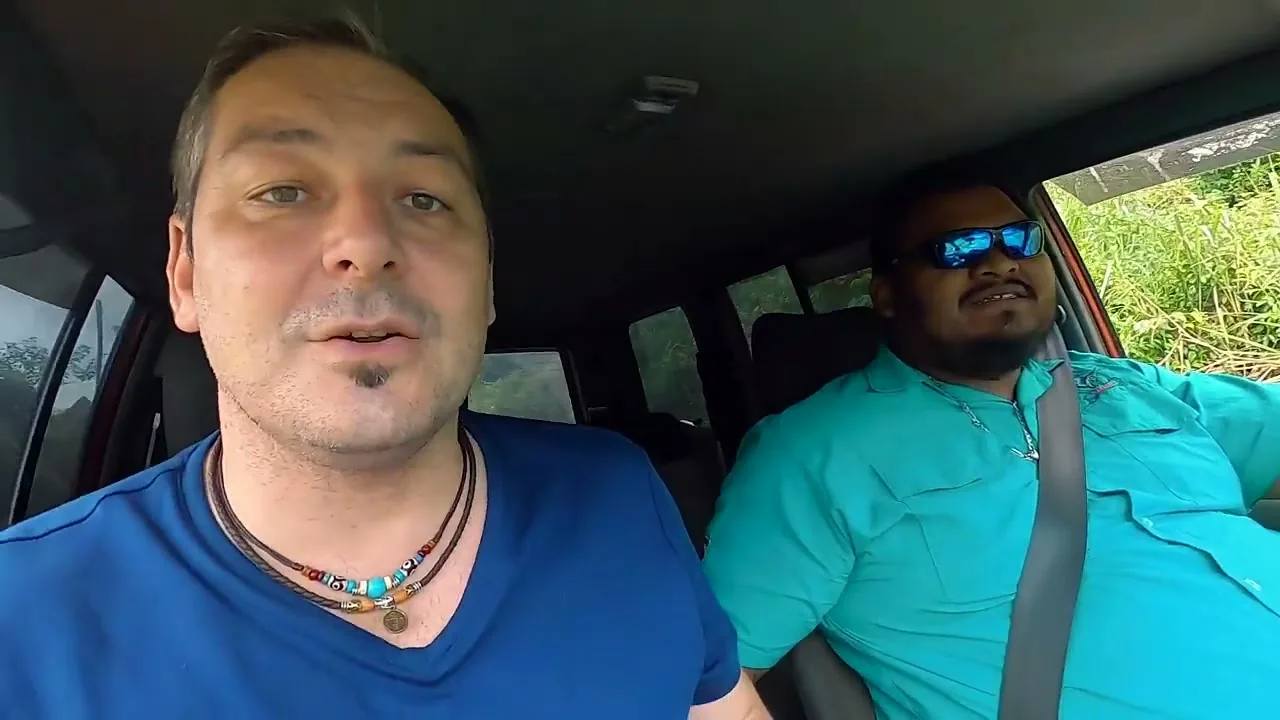 Sorin and his driver Mauricio inside a car at the magnetic hill in Costa Rica