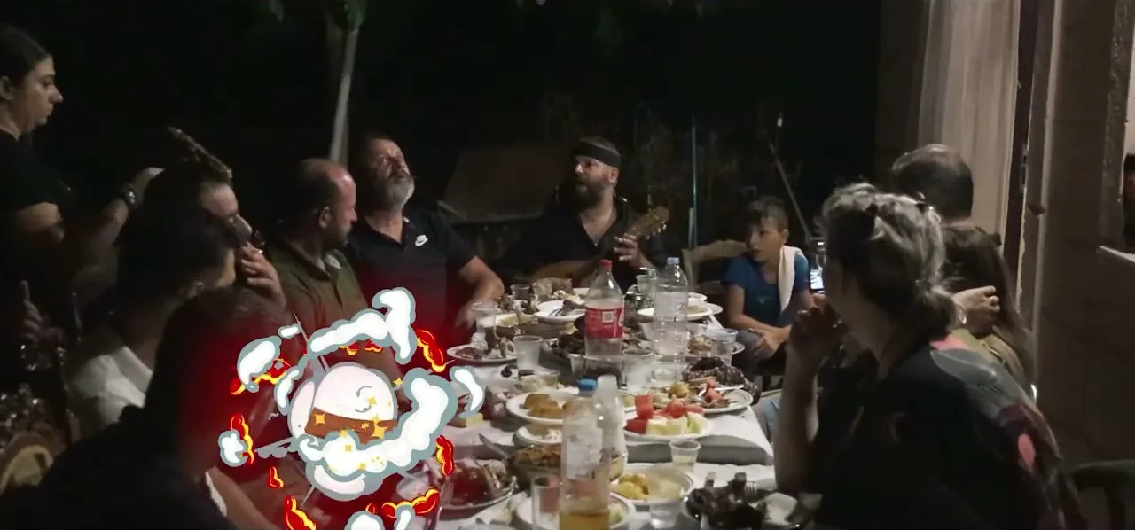 Antikristo, lamb roasted on stakes around an open fire, at a Cretan gathering