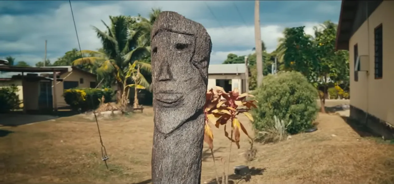 A carved wooden figure standing in Sabeto village, Fiji