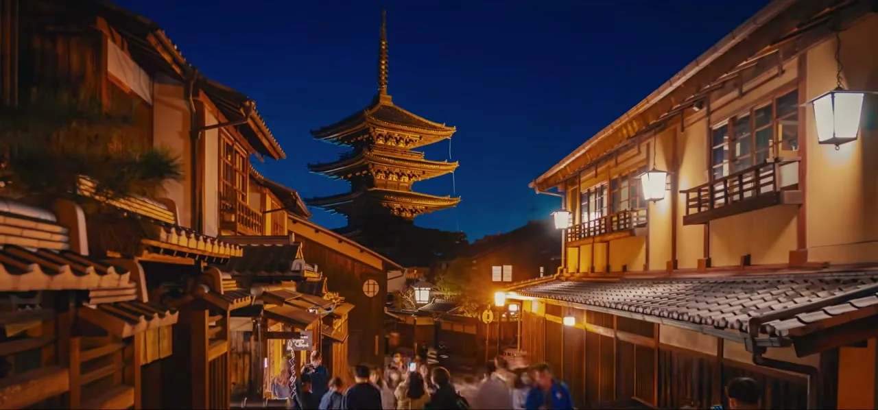 The Gion district of Kyoto at night, with the lit Yasaka Pagoda and traditional wooden machiya houses