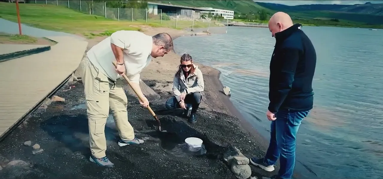 Burying rye bread dough in hot volcanic sand to bake in Iceland