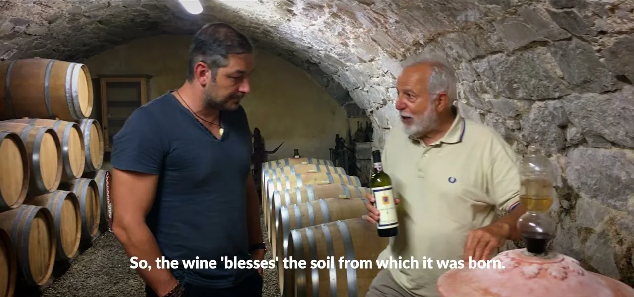 A wine tasting in the barrel cellar of Corte di Valle winery in Chianti, Italy