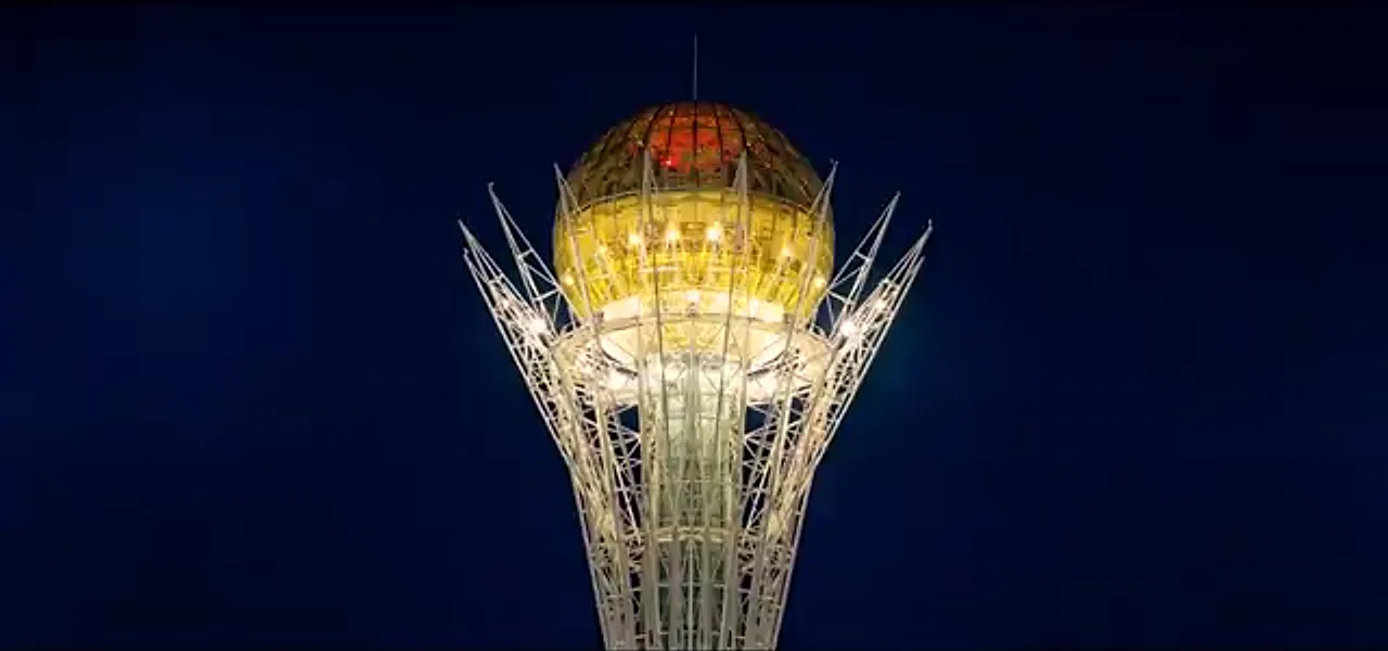 The Bayterek Tower in Astana lit up at night, Kazakhstan