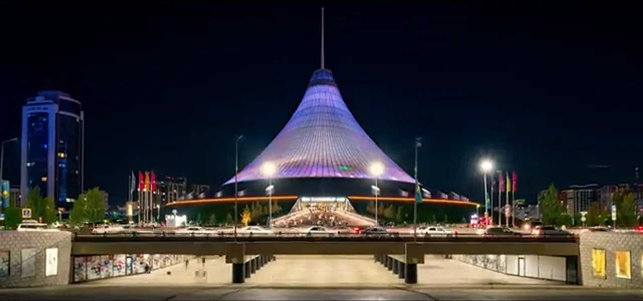 Khan Shatyr, the giant tent-shaped building in Astana, lit at night, Kazakhstan