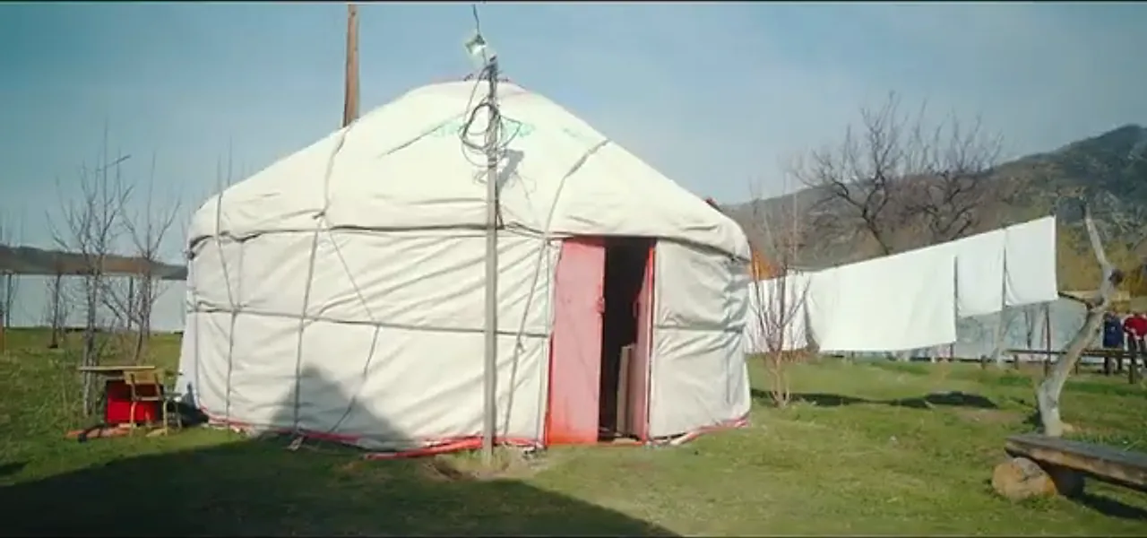 A white nomadic yurt on the Kazakh steppe