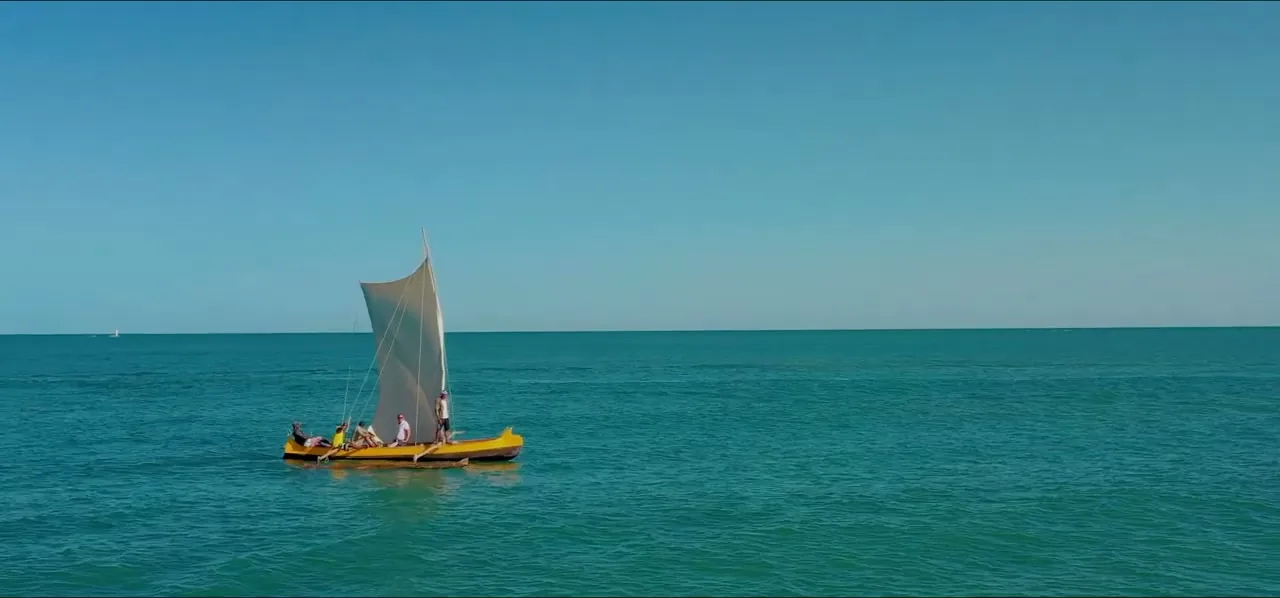 A traditional wooden sailboat on the turquoise water of the Mozambique Channel, Madagascar