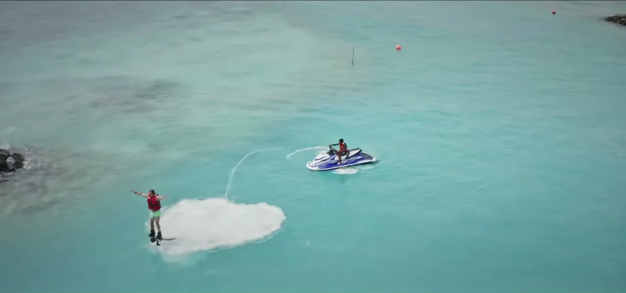 Water sports over the turquoise lagoon of a Maldives resort