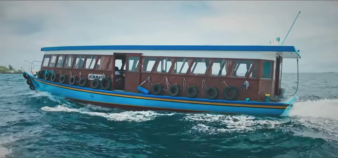 A traditional Maldivian dhoni boat on the water near Malé, the capital of the Maldives