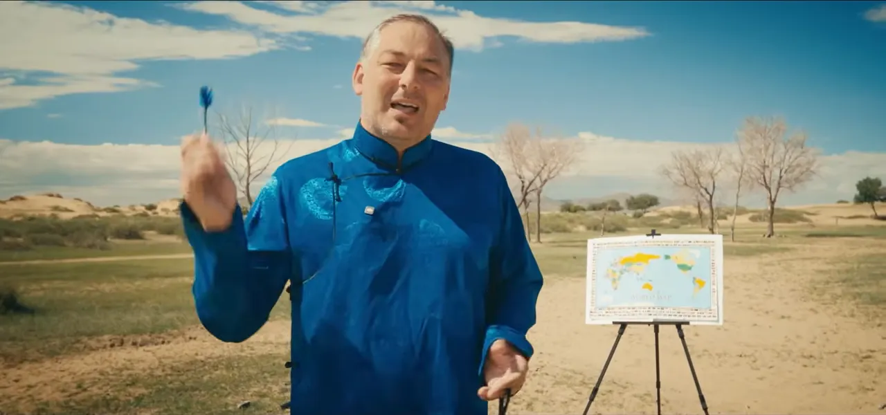 Sorin in a blue Mongolian deel about to throw a dart at a world map on an easel