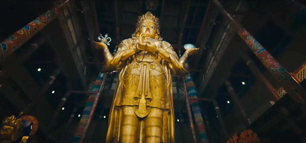 The towering gold-covered Migjid Janraisig statue inside Gandan Monastery, Ulaanbaatar