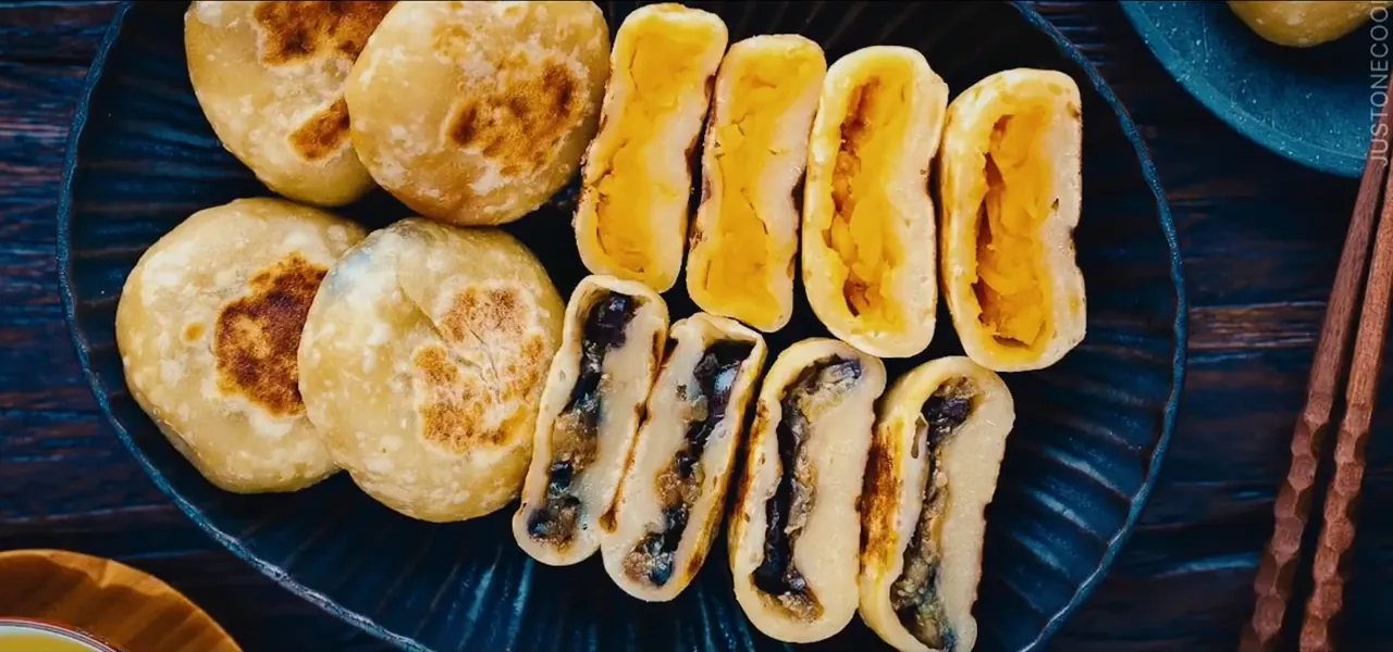A plate of grilled oyaki dumplings, a specialty of Nagano, Japan