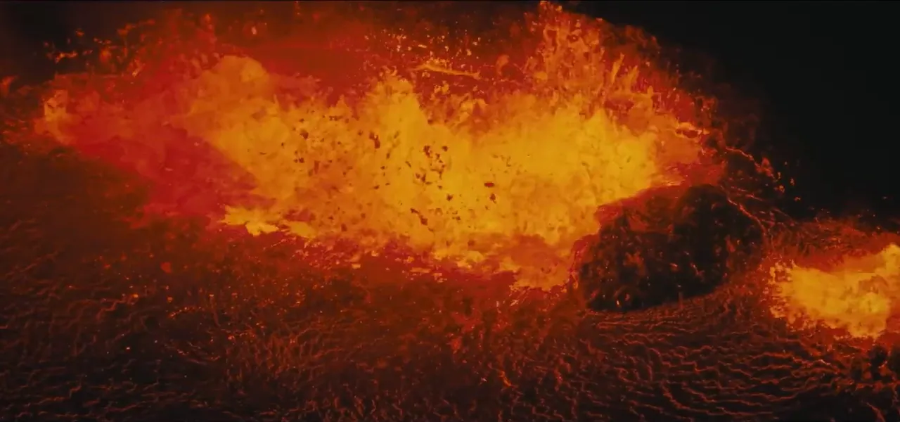 Molten, frothy orange lava, illustrating volcanic activity