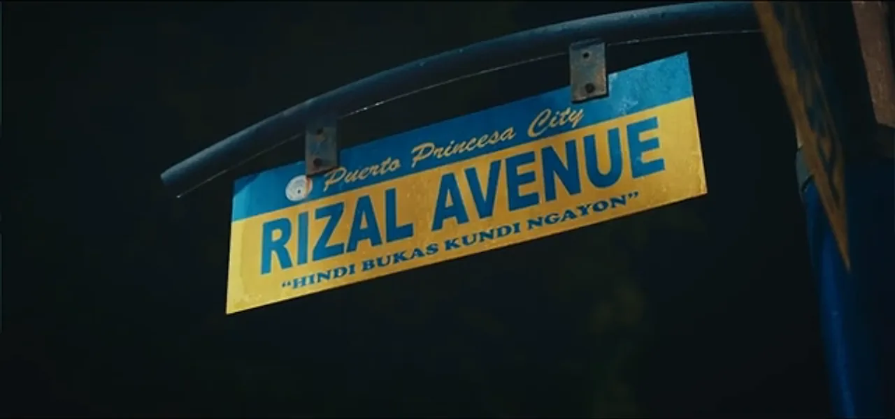 A 'Rizal Avenue' street sign in Puerto Princesa City, Philippines