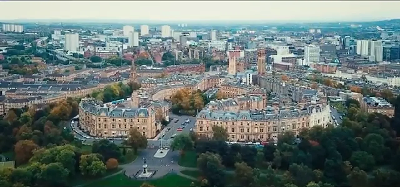 Aerial view of Glasgow's Victorian terraces, parks and spires