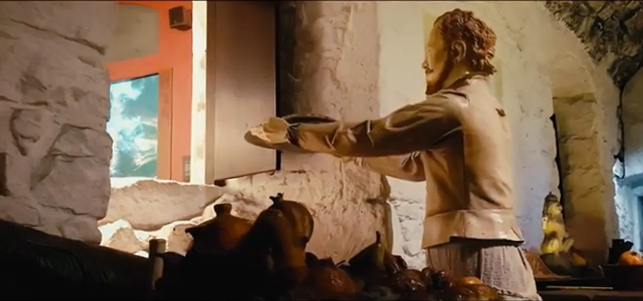 A lifelike model of a cook at work in the recreated Great Kitchens of Stirling Castle