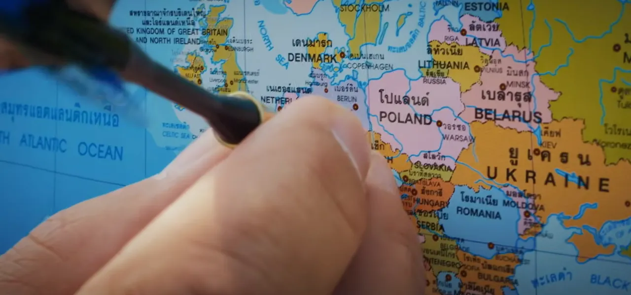 A dart landing on Germany on a world map at a palace in Seoul