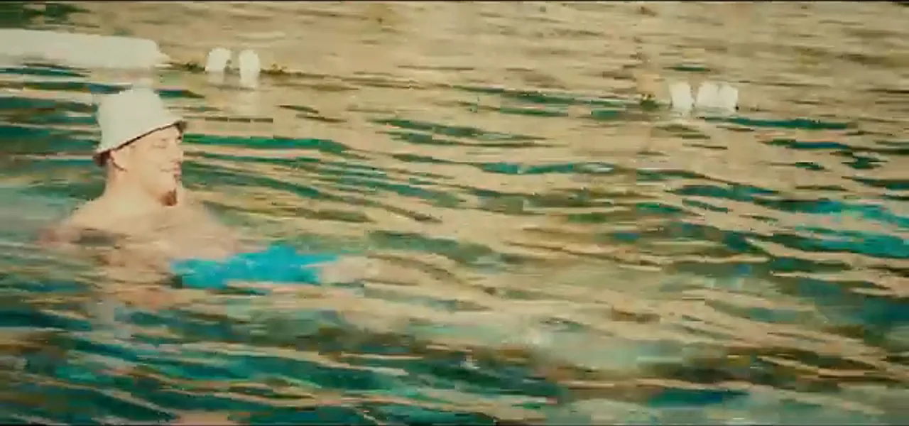Sorin swimming in Cleopatra's Pool among submerged Roman columns at Pamukkale