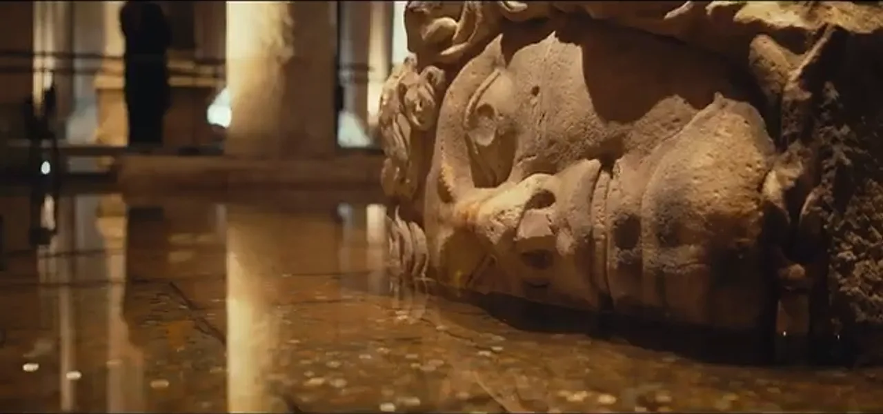 A Medusa head carved at the base of a column in the Basilica Cistern
