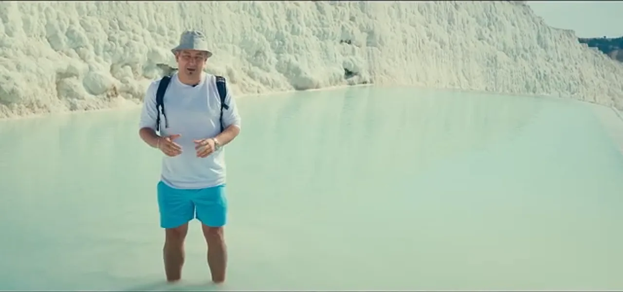 Sorin walking barefoot across the white terraces of Pamukkale