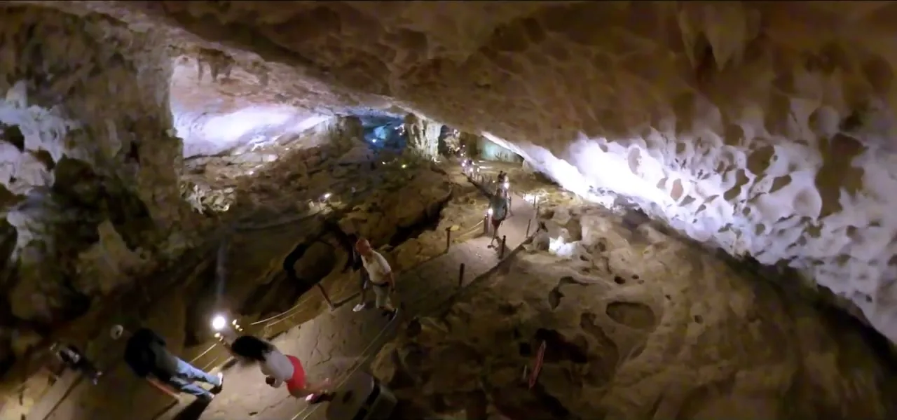 The vast illuminated chambers of Sung Sot (Surprise) Cave in Halong Bay, Vietnam
