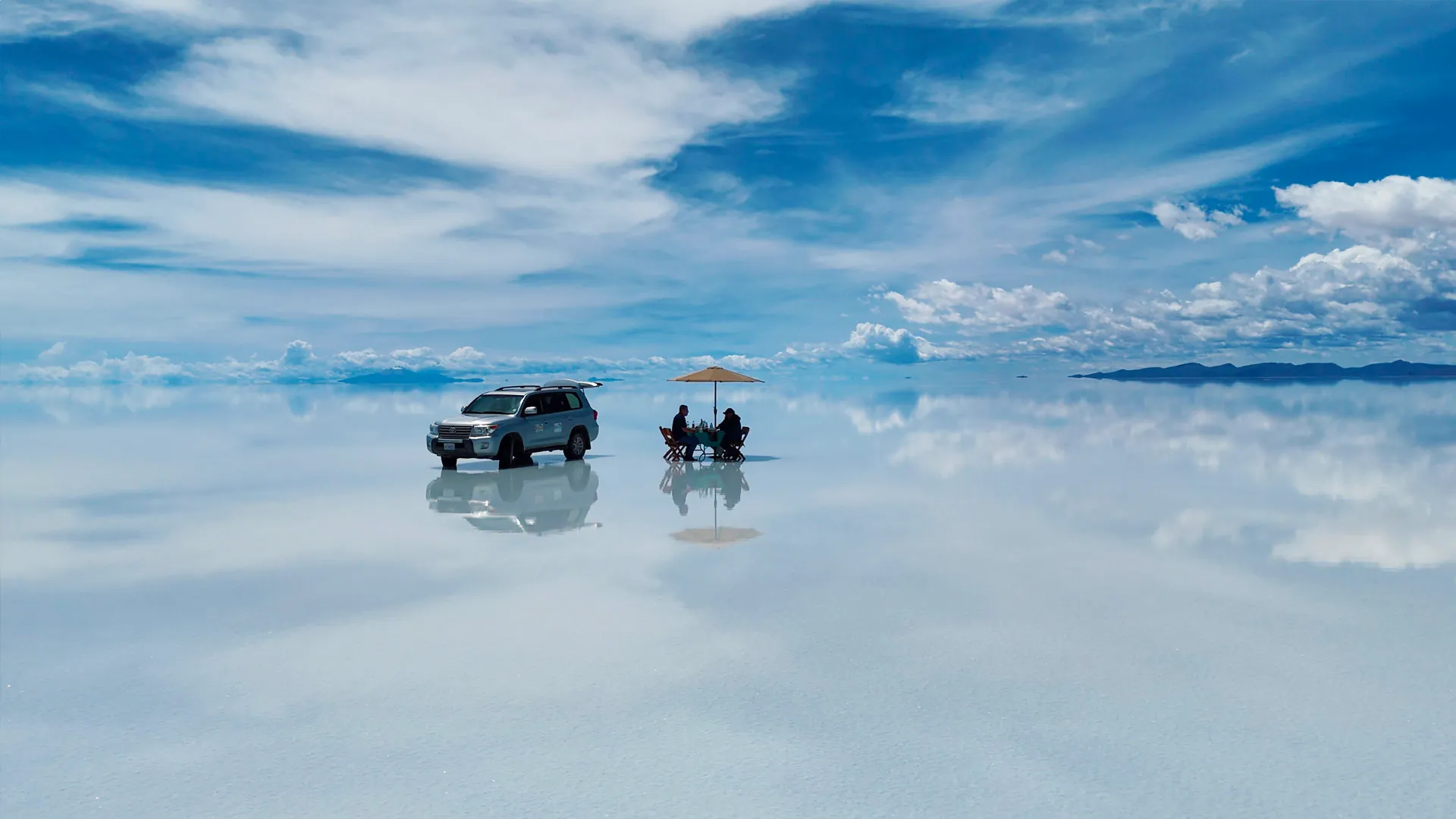 A lone traveler against a vast Travel by Dart landscape